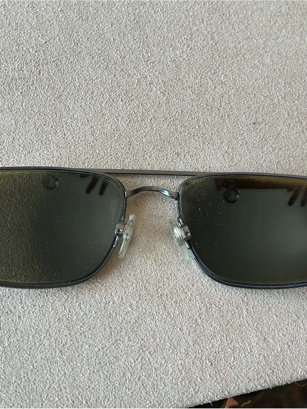 Revo Polarized Sunglasses — Black Frame with Blue Logo